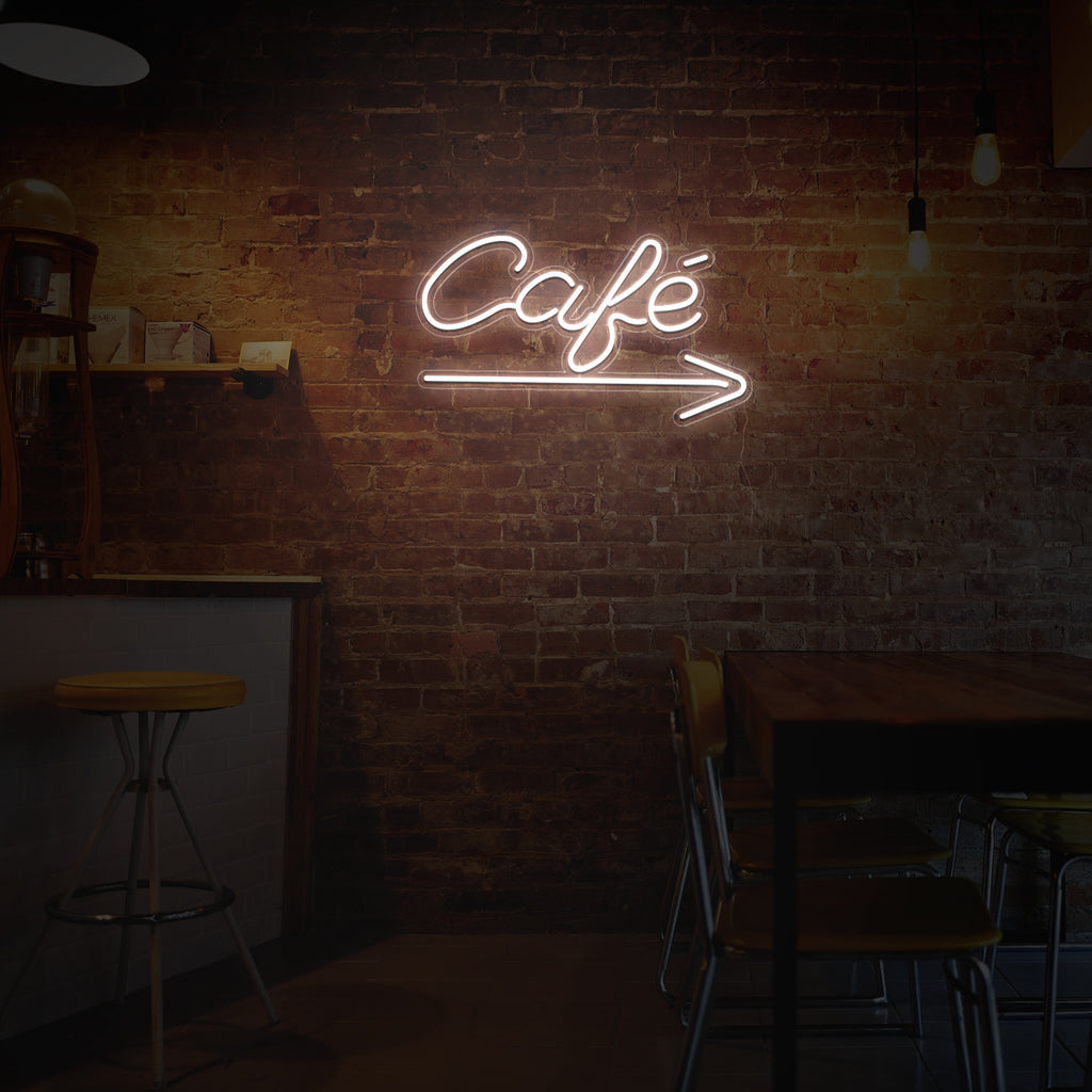 cafe neon sign on a wall