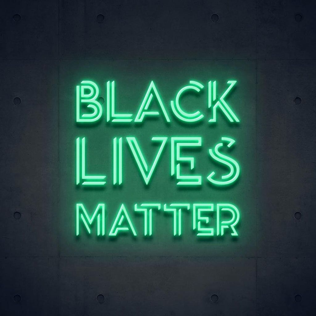 a green led neon sign with letters of BLACK LIVES MATTER