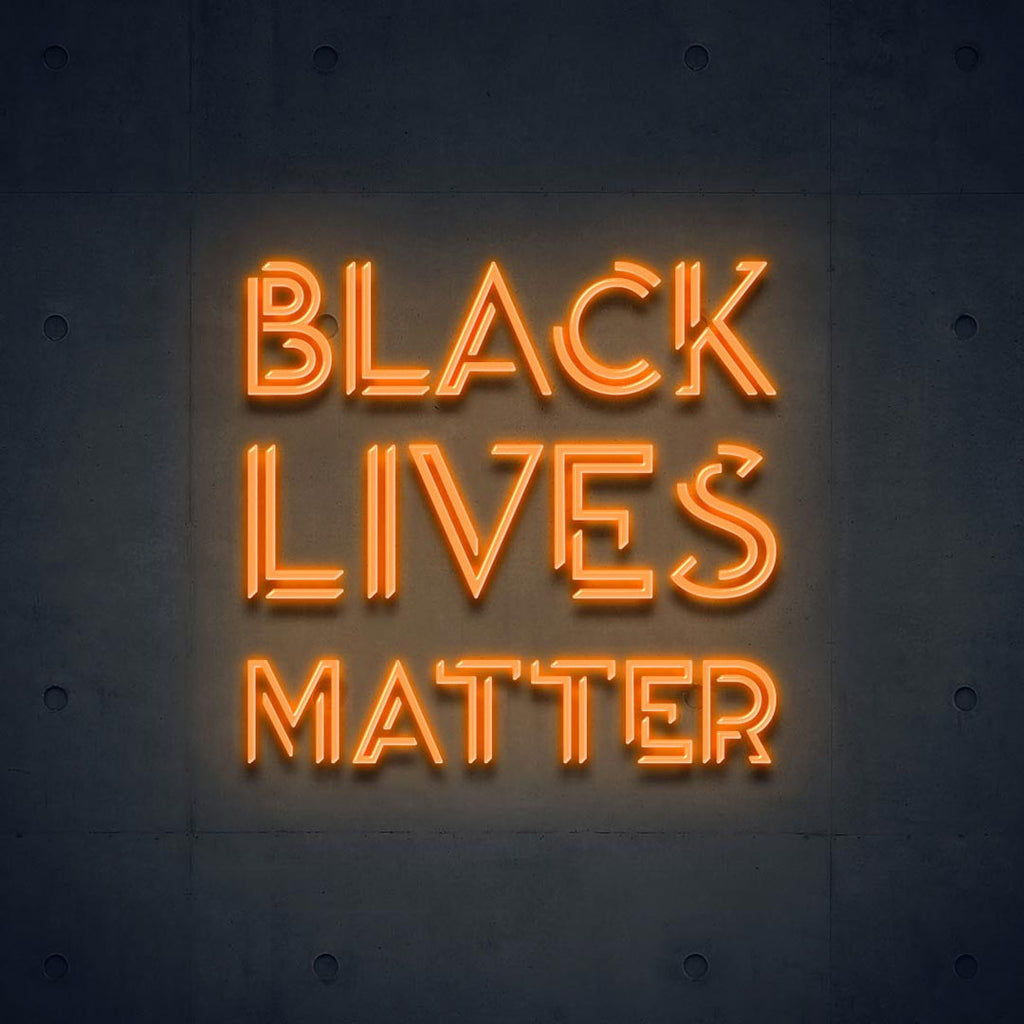a orange led neon sign with letters of BLACK LIVES MATTER