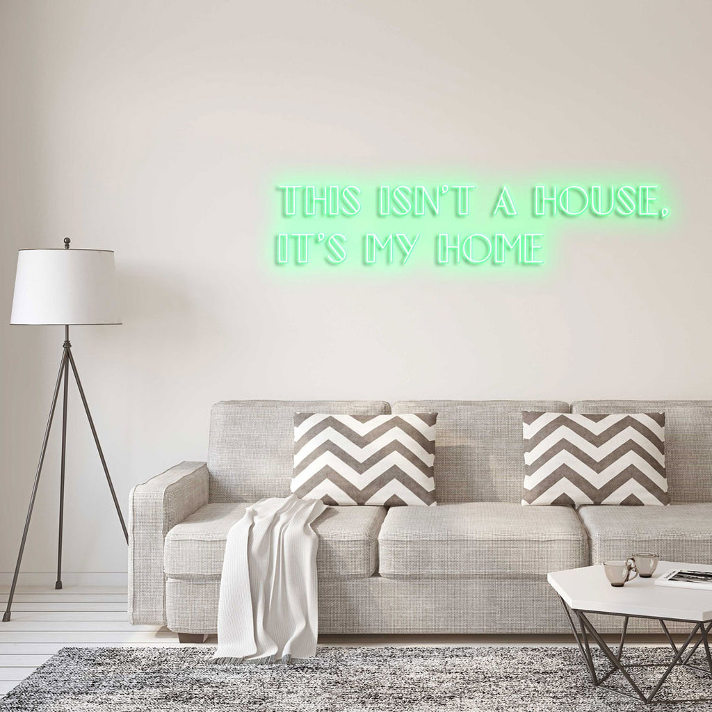 light green led neon sign of text THIS ISN'T A HOUSE, IT'S MY HOME