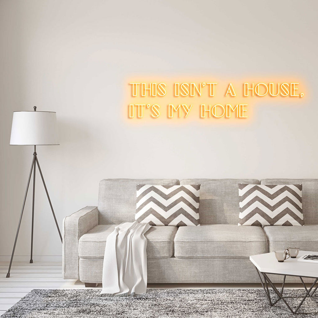 orange led neon sign of text THIS ISN'T A HOUSE, IT'S MY HOME