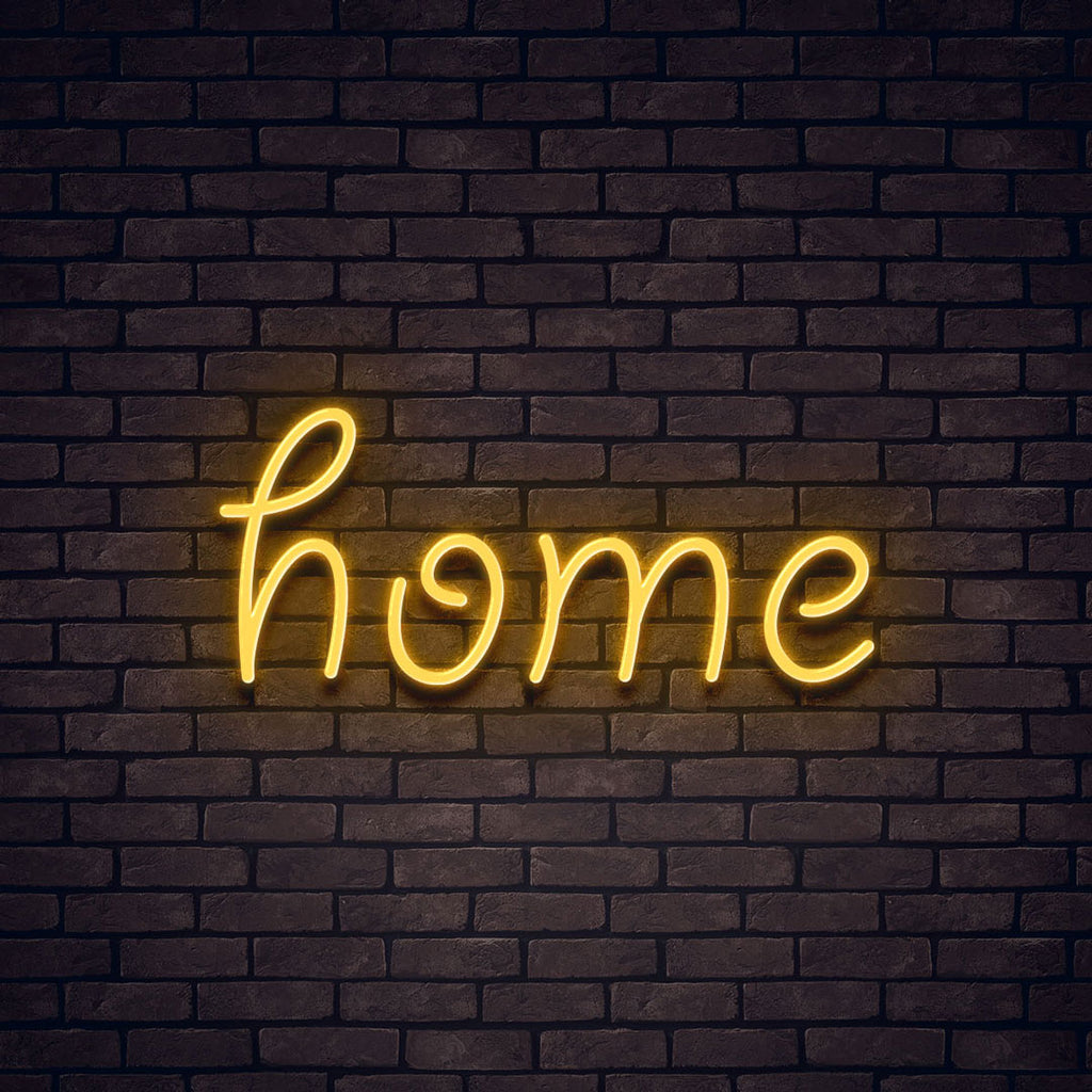yellow led neon sign of text home