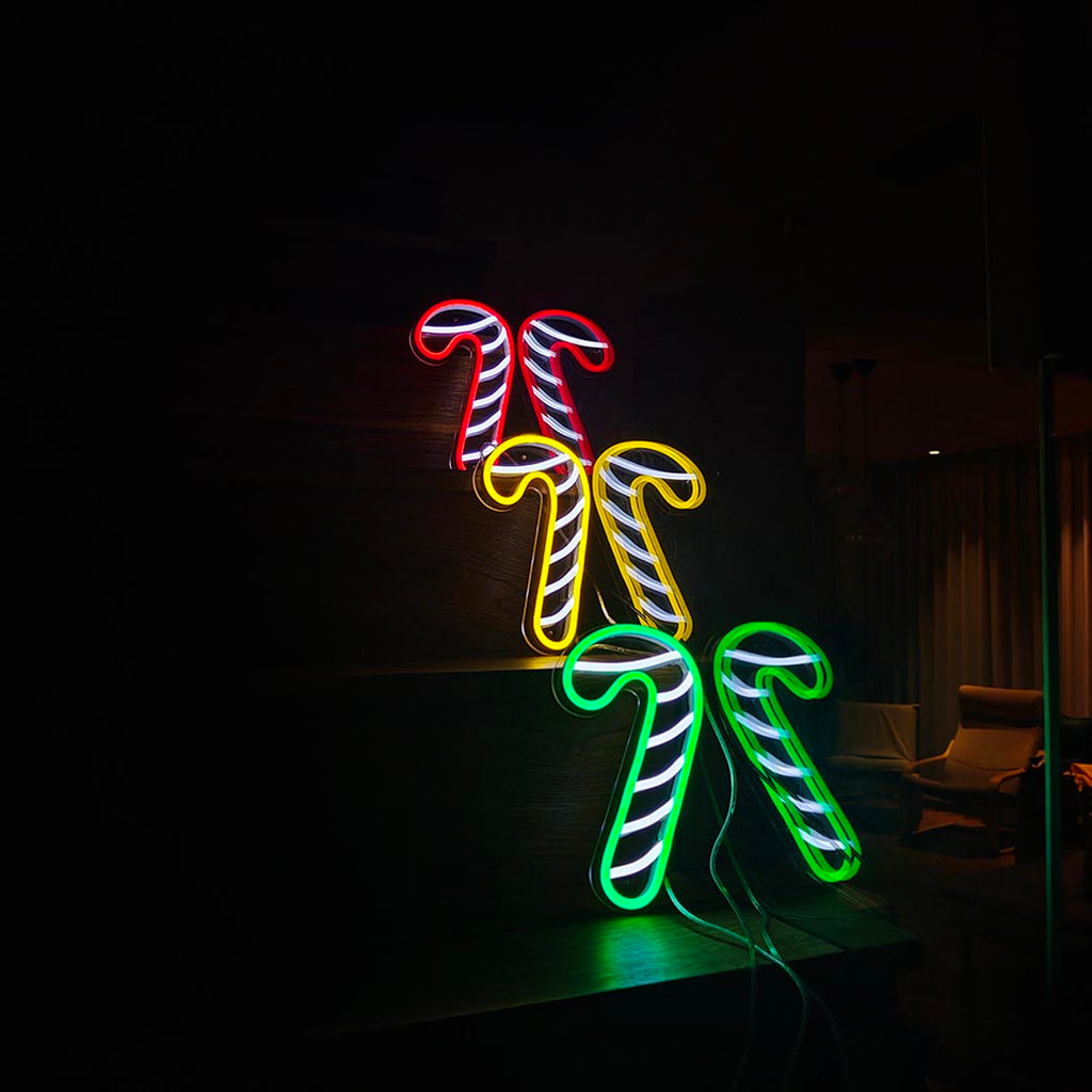 the staff led neon sign with color of red, green, and yellow