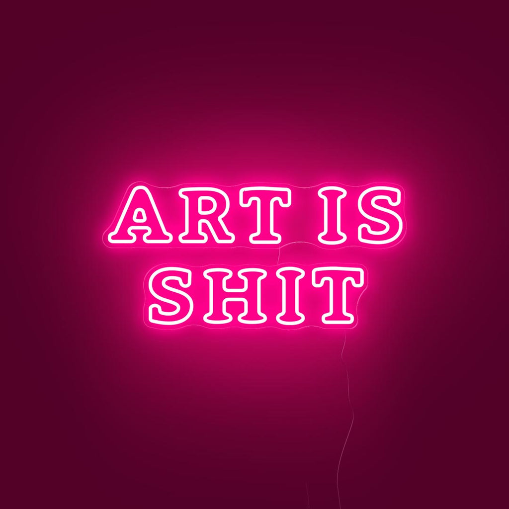led neon sign with letters ART IS SHIT