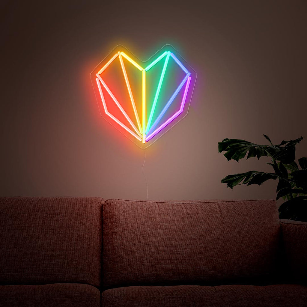 a geometrical heart neon sign with rainbow color or red, orange, yellow, blue and purple