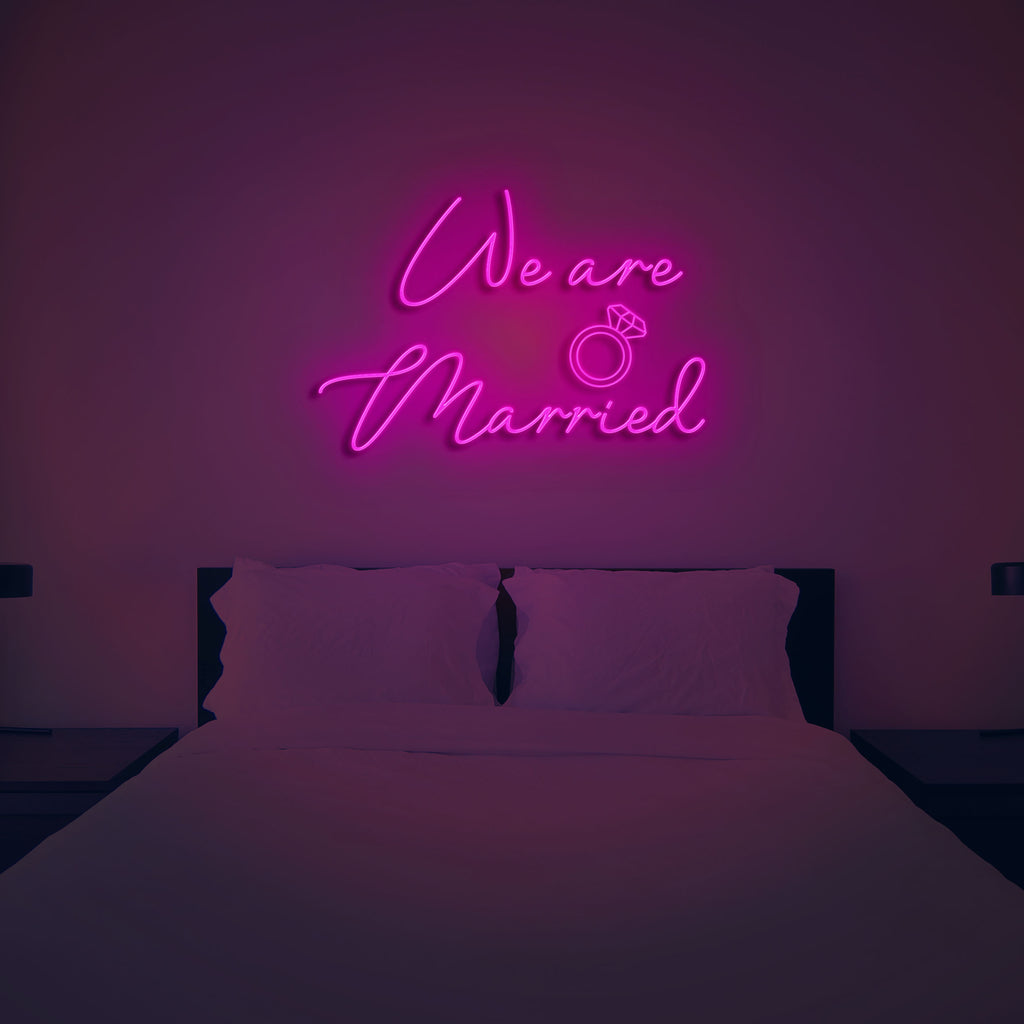 we are married neon sign hot pink